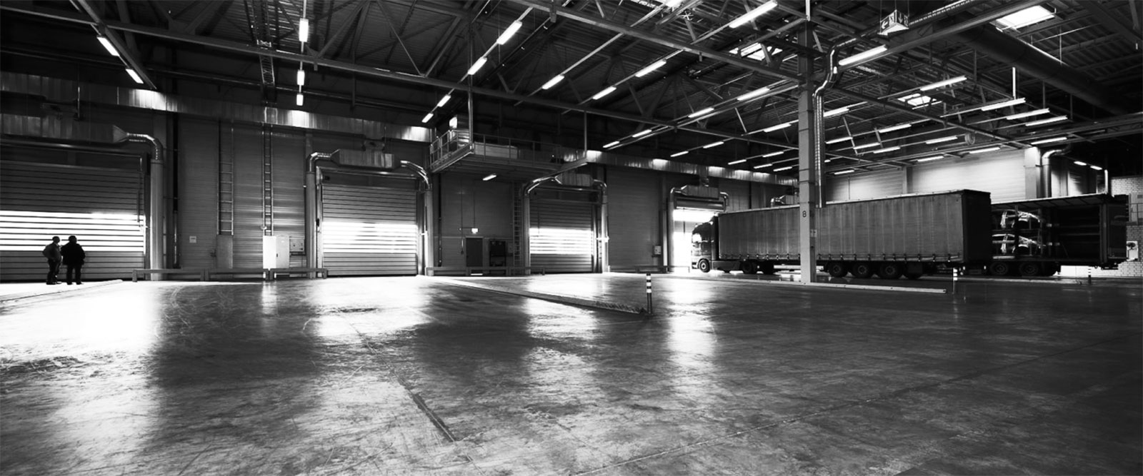 Commercial warehouse with shipping trucks